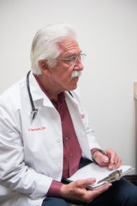 Dr. Dale Carrison knows first-handthat hearing aids save lives.